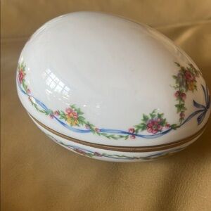 Chamart Limoges egg box with hand painted floral design.